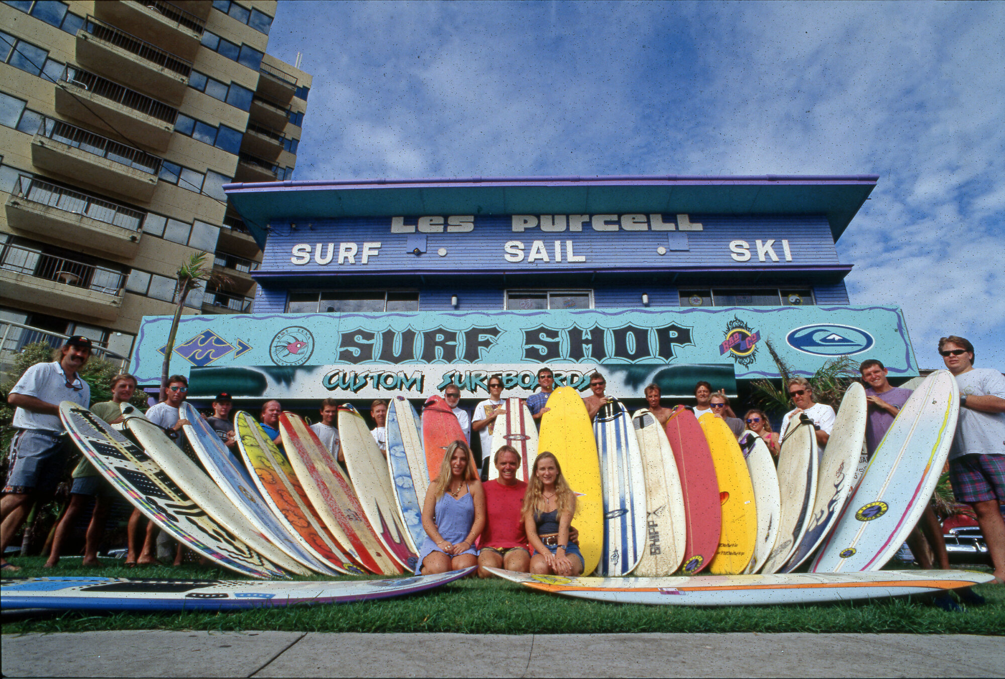 Surfers displaying their boards