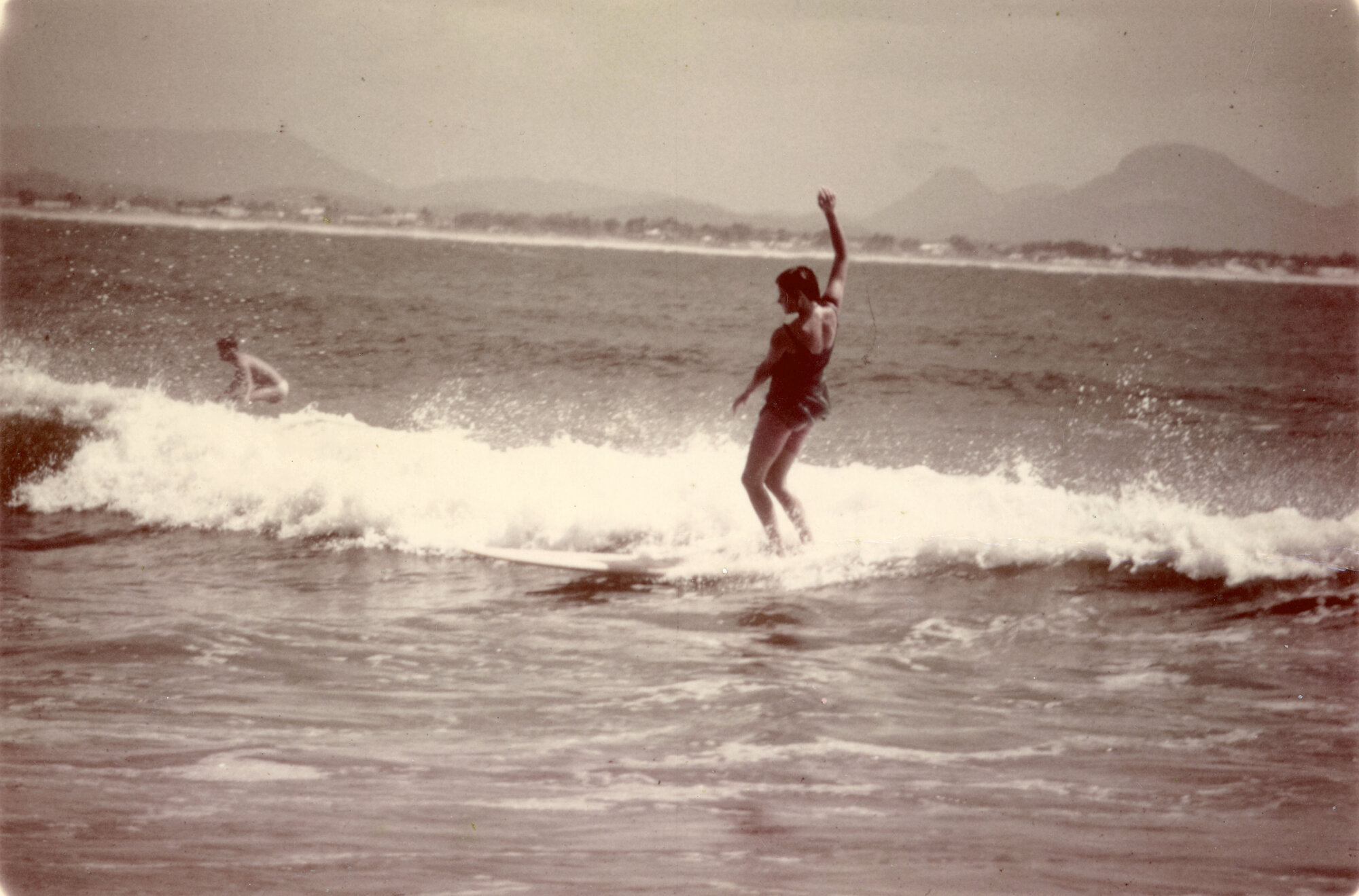 Noela surfing at The Spit, age 15, 1963