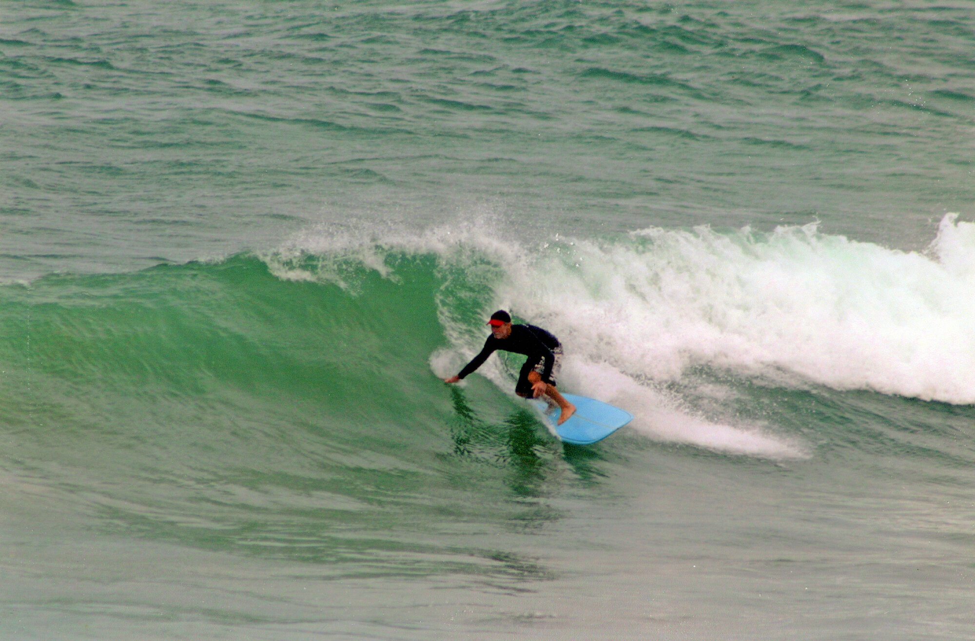 Barry surfing Arrawarra, NSW. ca. 2000