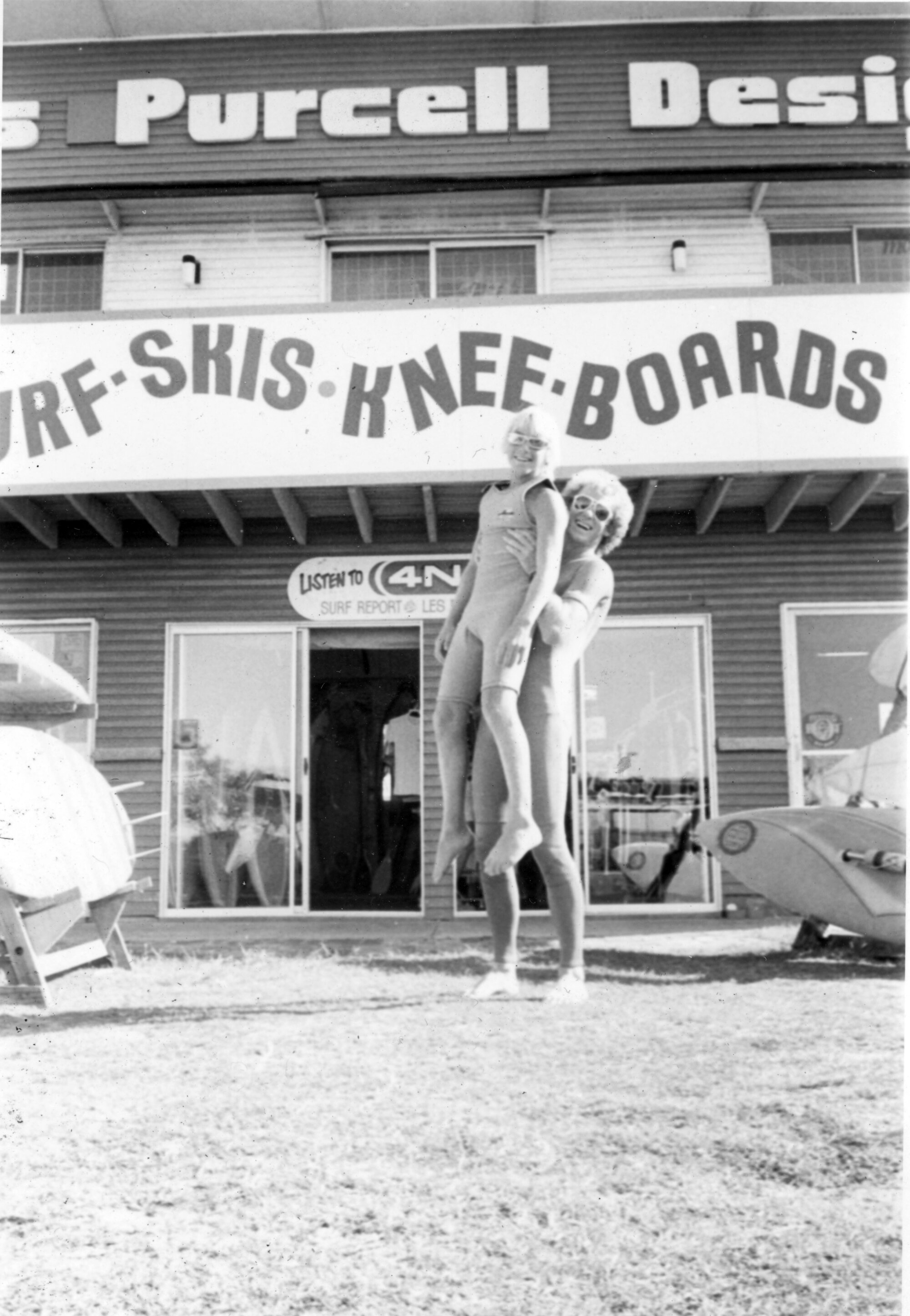 Greg Curtis and Danny Nixon outside Les Purcell's Surf Shop, ca 1980