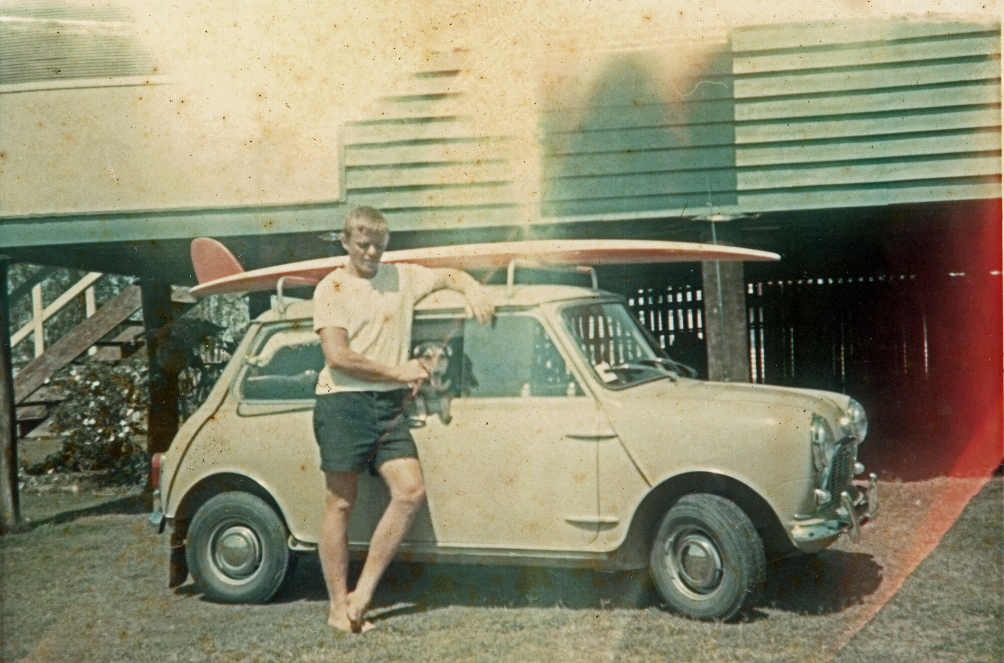 Les with his surfboard on his mini, 1966 