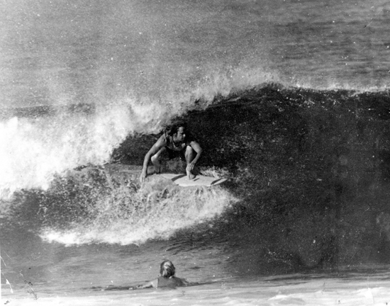 Surfer Andy Geddes surfing at King's Beach, Caloundra