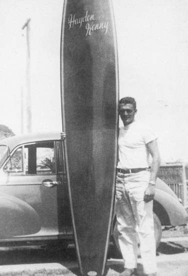 Hayden Kenny with his Gordon Woods surfboard, ca 1957