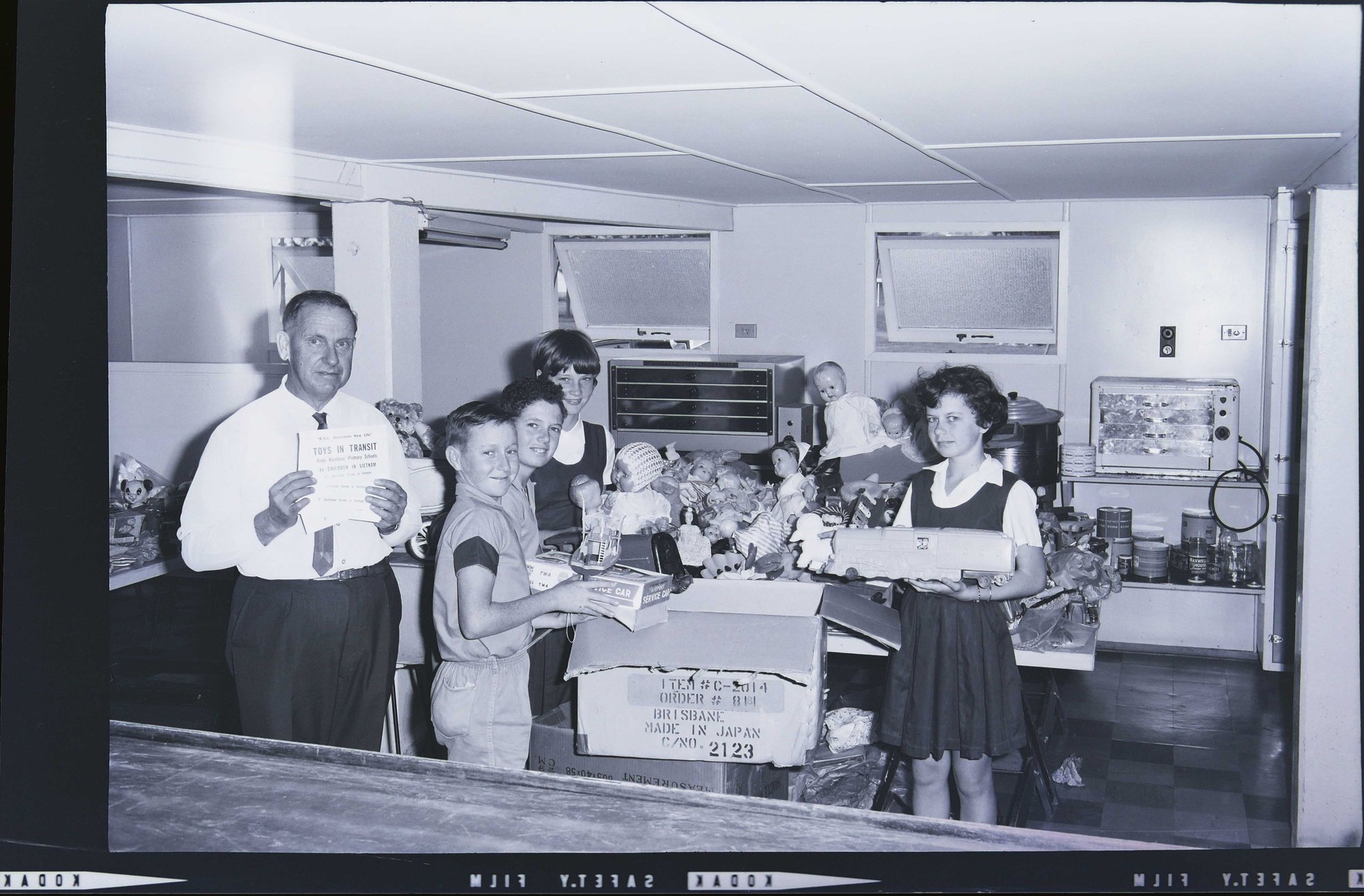 #22 - 1966 School children packing toys for Vietnam