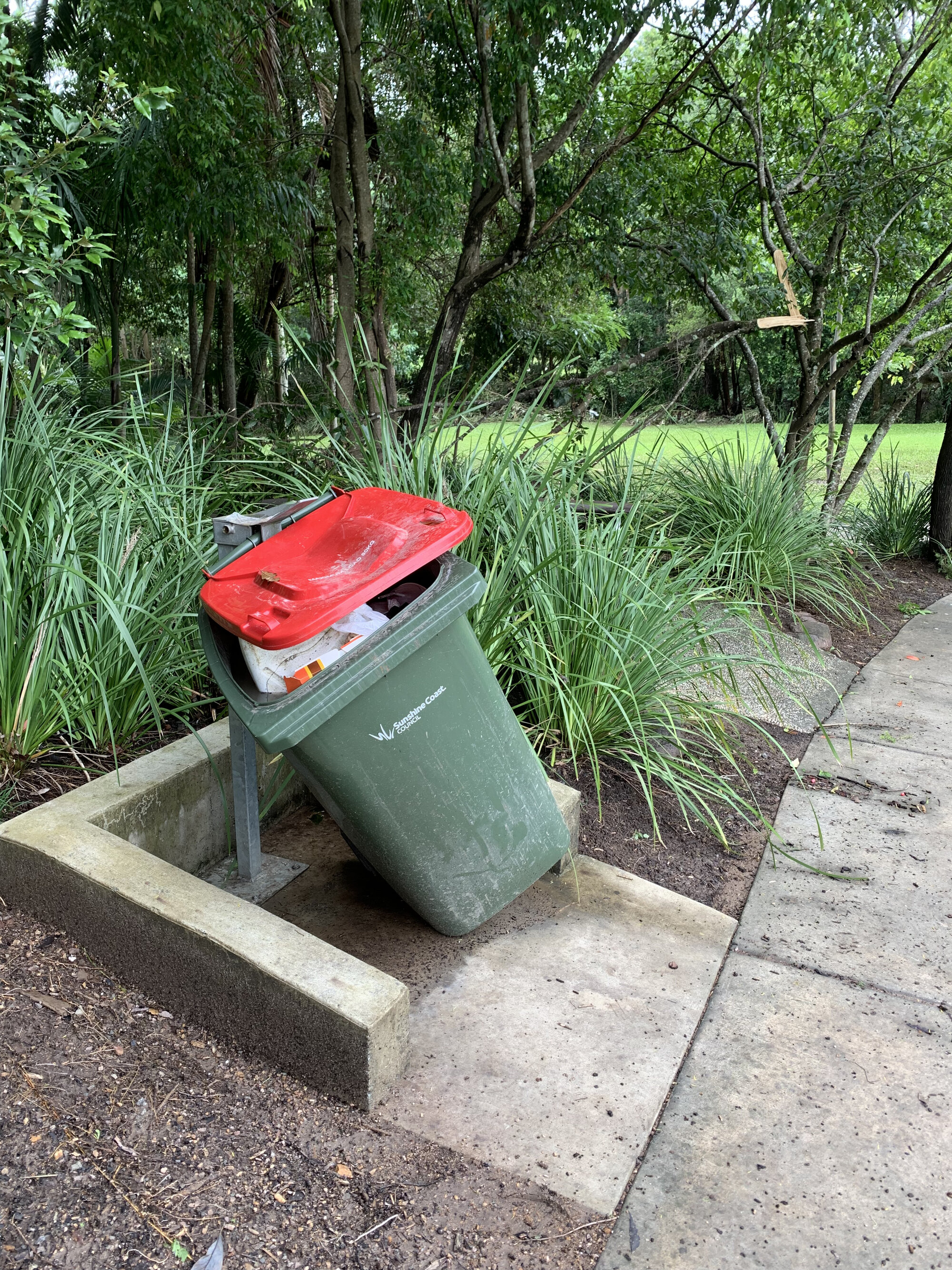 Flood affected wheelie bin at Quota Park, Nambour. February 2022