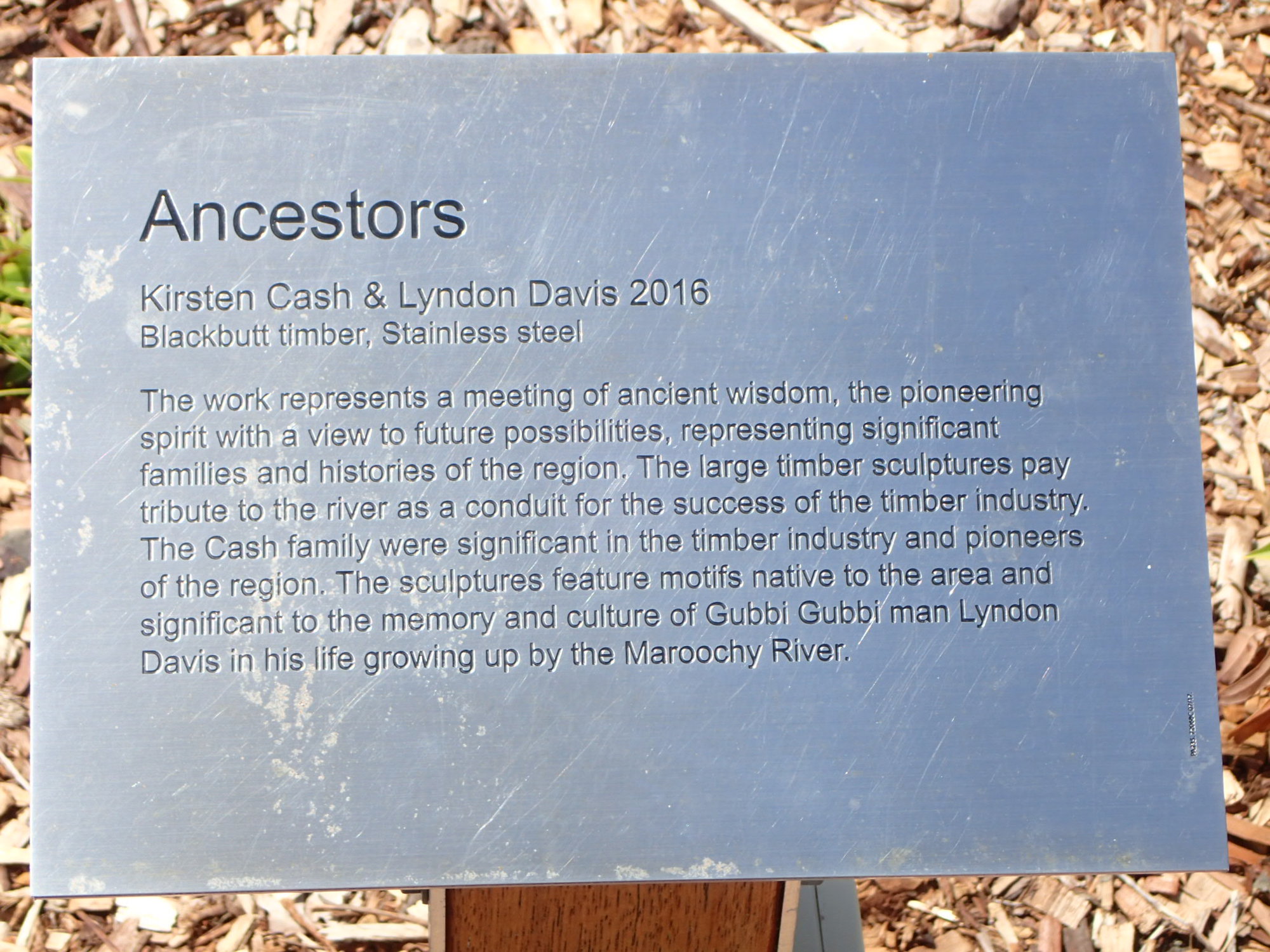 Ancestors, Wooden carved shields depicting aboriginal images near shelter near Chambers Island walkway