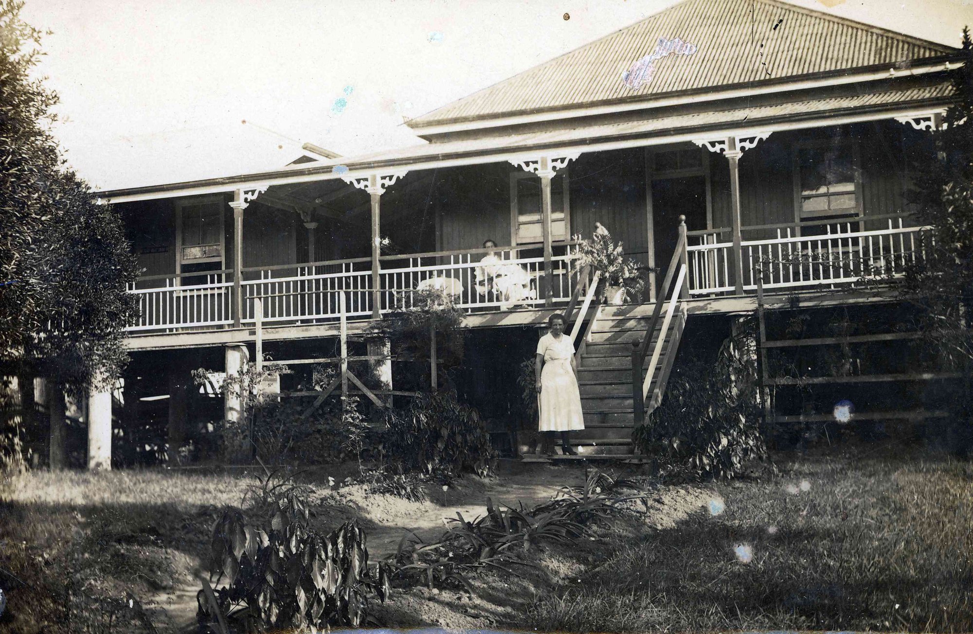 Nurse Emily Luke on steps of Sunny Brae, Mrs Otto (Louie) Fritz on verandah following birth of Victoria May 24th May 1934.
