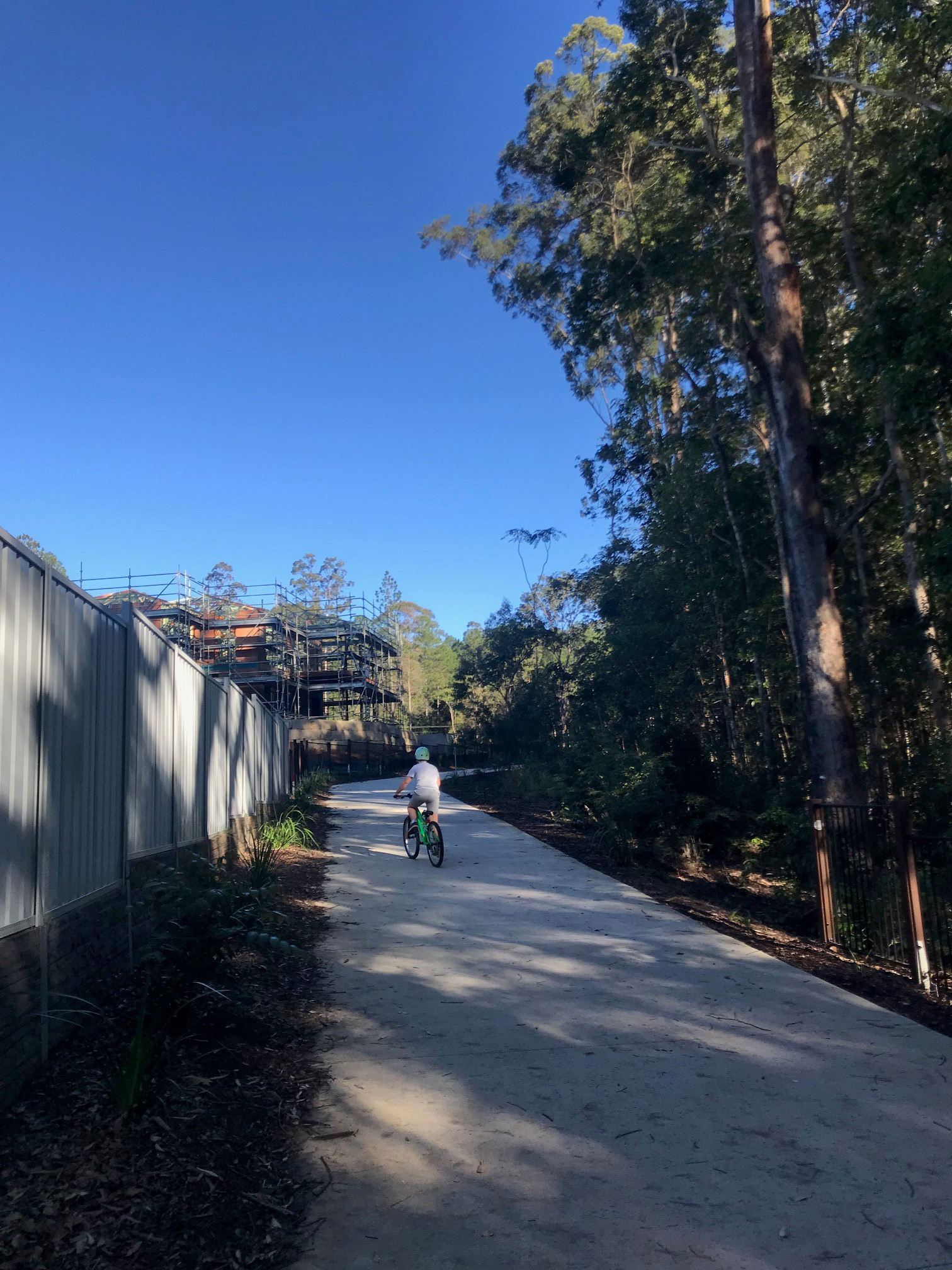 Bike riding on pathway at Paynter's Park, Woombye