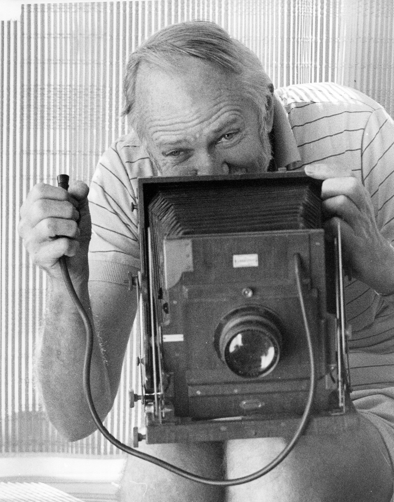 Bill Robinson with his studio camera, Nambour, ca 1978