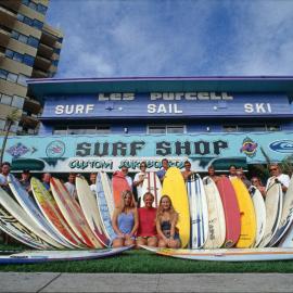 Surfers displaying their boards