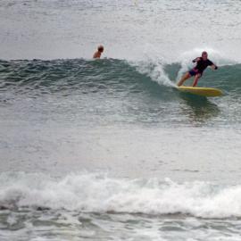 Barry surfing at First Point, Noosa ca. 1994