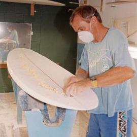 Les shaping a surfboard, ca 1980
