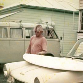 Les with a surfboard, combi van, 1969 