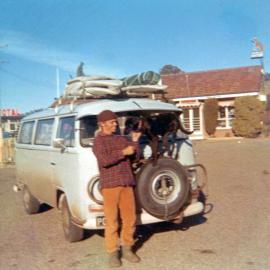 Combi with surfboards strapped to roof, 1972