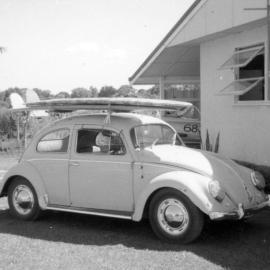 VW Beetle with surfboards, 1972